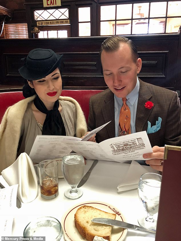 Usually, 1930s vocalist Richard splits his time performing between his home country of Germany and Canada. Pictured, the couple enjoy a meal dressed in their vintage finds