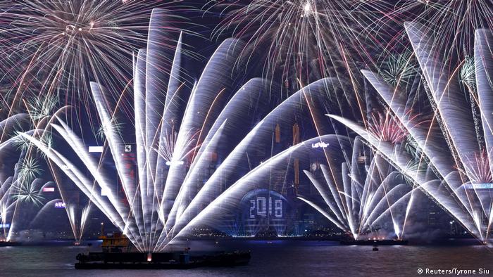Fireworks over Victoria Harbour and Hong Kong Convention and Exhibition Centre in Hong Kong